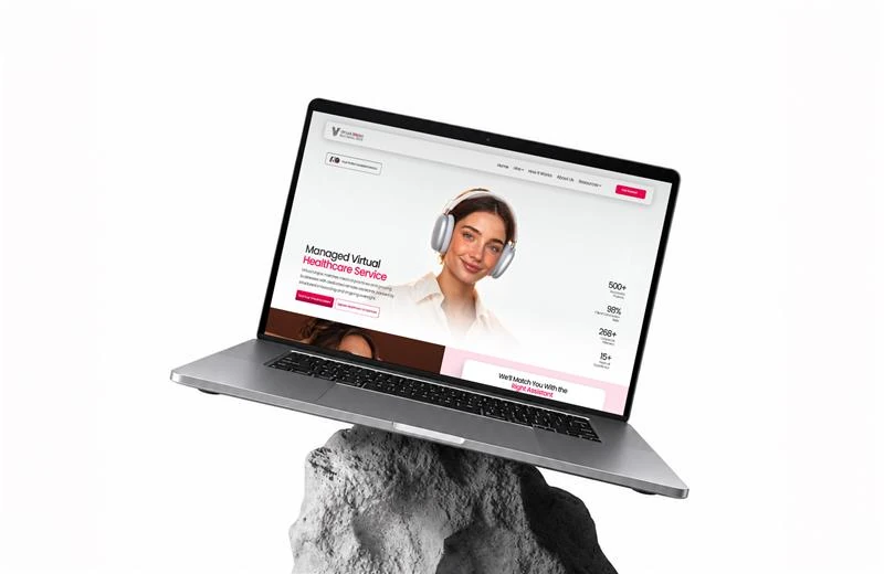 Laptop balanced on a rock