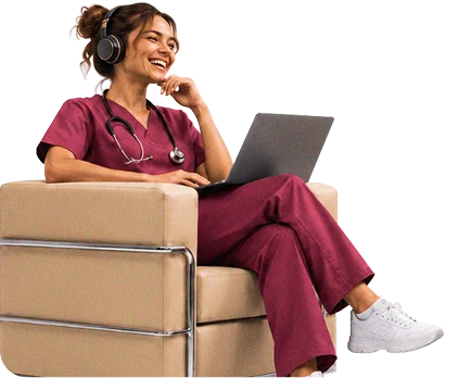 Assistant working on a laptop in an armchair